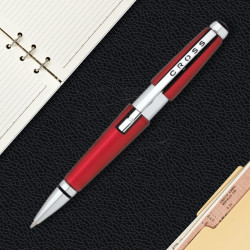 Stylo roller Cross Edge rouge présenté sur un carnet