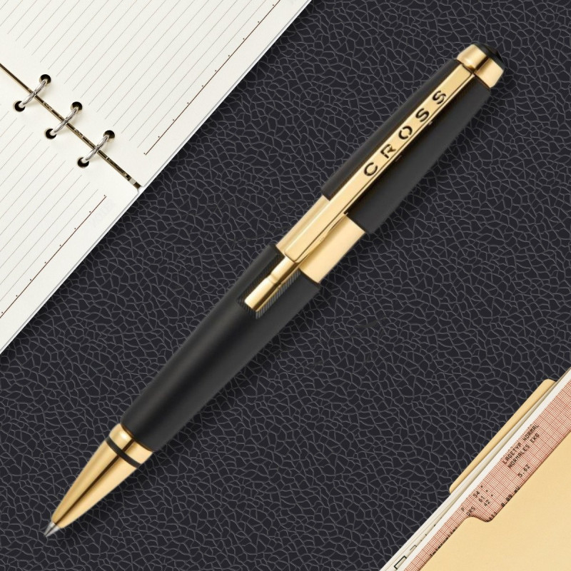 Roller Cross Edge noir et or en situation sur un bureau